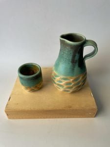 ceramic pitcher and cup set